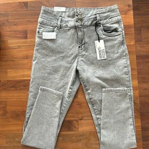 Grey acid wash jeans